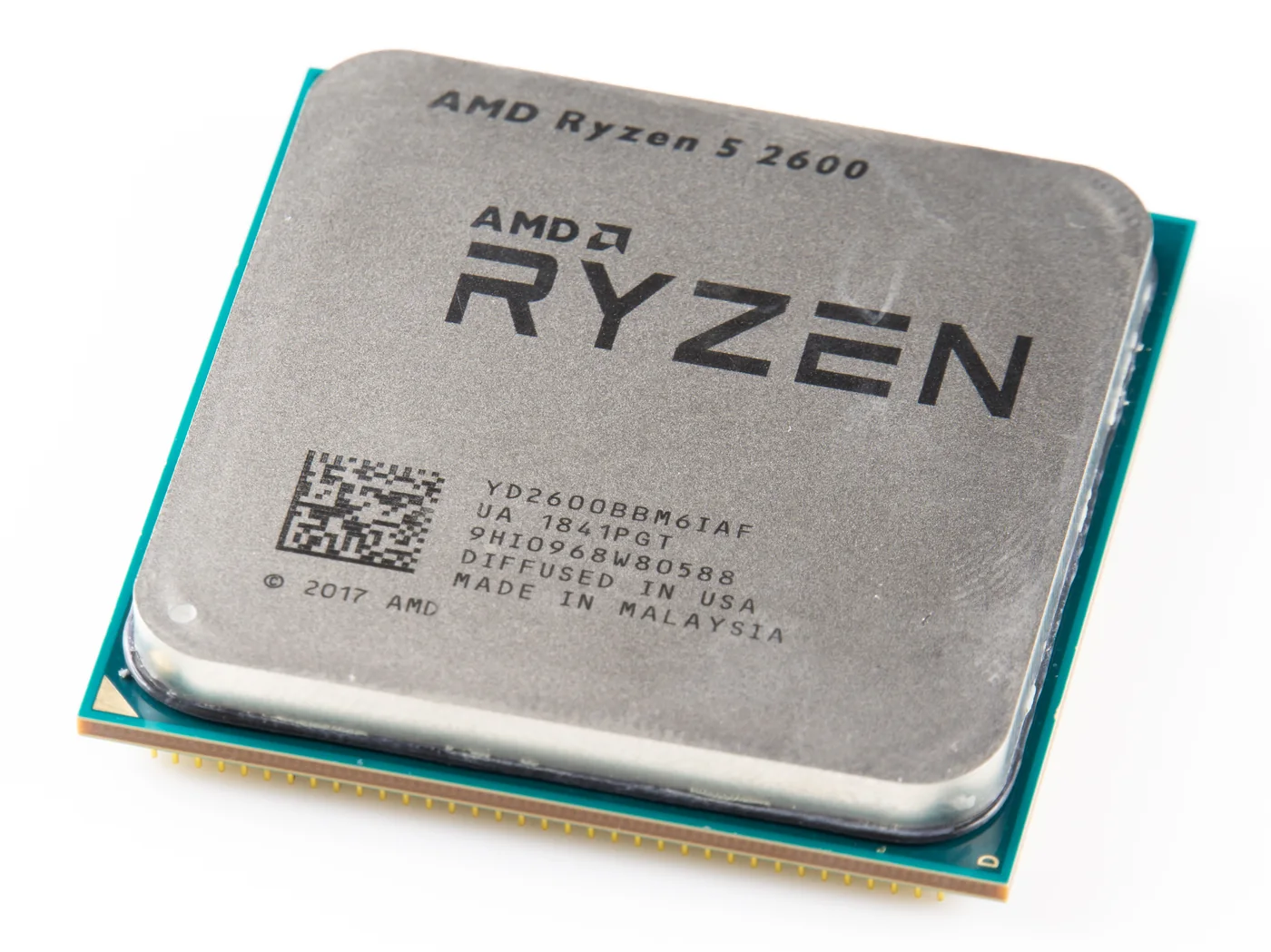 AMD Ryzen desktop processor showing its heat spreader and contact pins