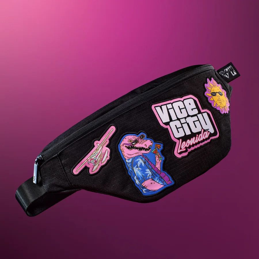 Black ripstop crossbody bag with pink patterned lining and woven Leonida Keys patches
